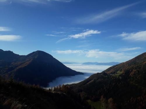 a view of a lake in the mountains at Bauernchalet Orainza in Ferlach