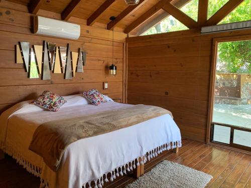 Postel nebo postele na pokoji v ubytování Zidada Hotel and Chalets