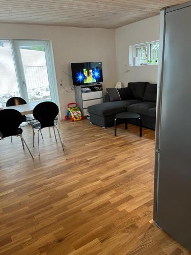 TV a/nebo společenská místnost v ubytování Vacationhouse in Klakvik