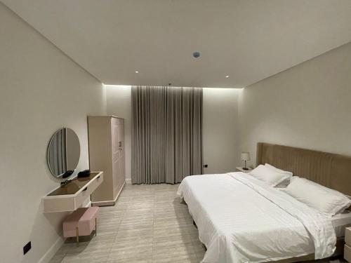 Kama o mga kama sa kuwarto sa روح ريزدنس Rawh Residence