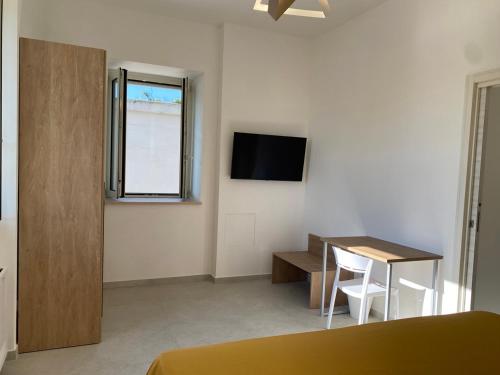 Televisyen dan/atau pusat hiburan di Cilento Contemporary House con idromassaggio Jacuzzi®