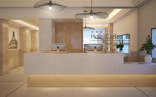 a lobby of a hotel with a reception desk at Sercotel Carlos III in Cartagena