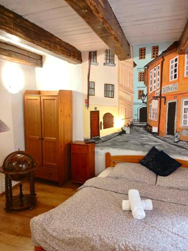 a bedroom with two beds in a building at Prague centrum house in Prague