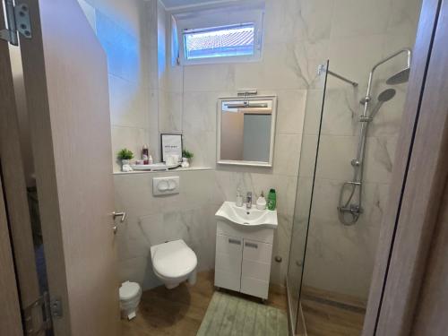 Koupelna v ubytování Bliss city apartments-Taurunum2