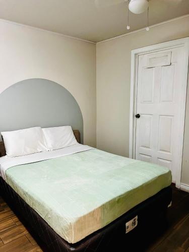 Postel nebo postele na pokoji v ubytování Otoya 1907 Hotel