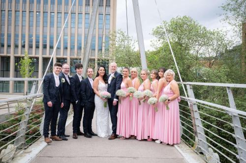 a group of people posing for a picture on a bridge at Radisson Blu Hotel, Durham in Durham