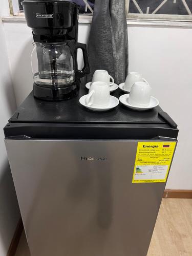 Kaffee-/Teezubehör in der Unterkunft Garden's Aparta hotel