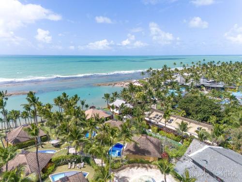 eine Luftaufnahme des Strandes des Resorts in der Unterkunft Nannai Residence Muro Alto Porto de Galinhas por Brevelar in Porto De Galinhas