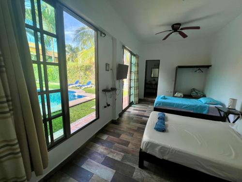 Postel nebo postele na pokoji v ubytování Cancun-Soho