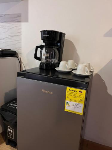 Kaffee-/Teezubehör in der Unterkunft Garden's Aparta hotel