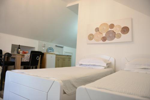 Apartments Idilaにあるベッド