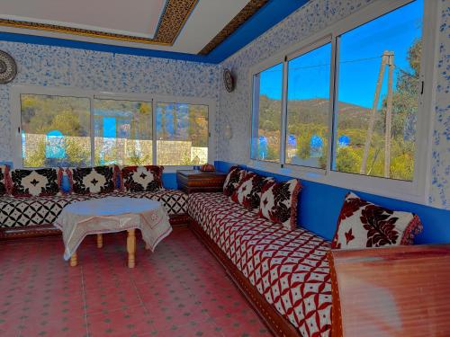 Χώρος καθιστικού στο The blue house