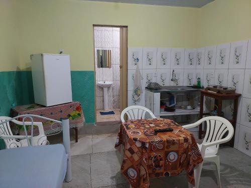 Η κουζίνα ή μικρή κουζίνα στο Casa para temporada