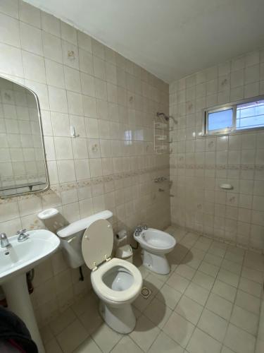 Koupelna v ubytování Departamento Pía II