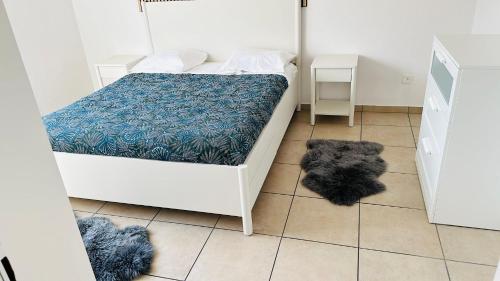 Postel nebo postele na pokoji v ubytování B&B Gino