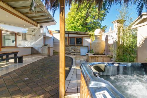 a backyard with a water fountain in a house at Dulwich house in Rose Park