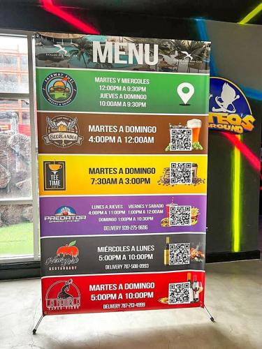 a sign for a menu in a store at Villa Brisas del Mar-Ocean View, Gated Community in Dorado