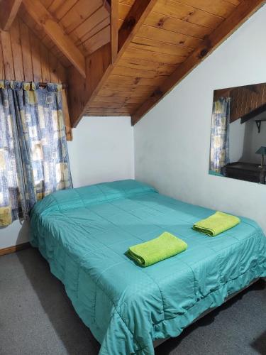 En eller flere senge i et værelse på Elordi