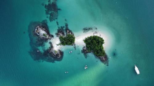 an aerial view of a small island in the ocean at GUEST HOUSE Floresta Mar in Angra dos Reis