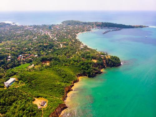an aerial view of a beach and the ocean at Villa Vista by The Serendipity Collection in Mirissa