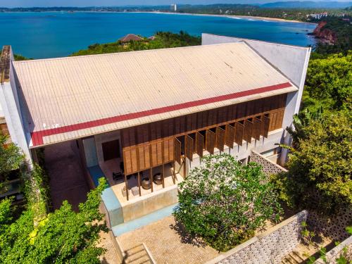 an overhead view of a house with a roof at Villa Vista by The Serendipity Collection in Mirissa