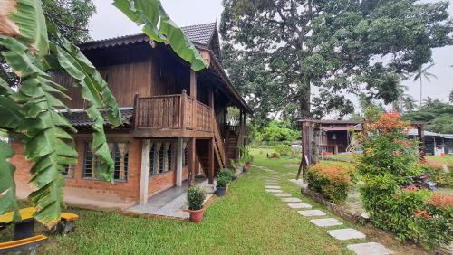 Zahrada ubytování Sayang Di Kaki Bukit