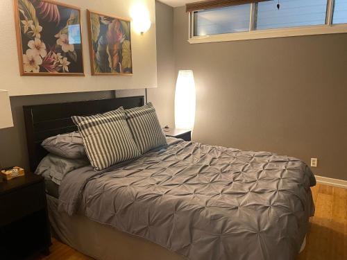 Ένα ή περισσότερα κρεβάτια σε δωμάτιο στο South Maui Ocean View Condo with Free Wifi and Parking