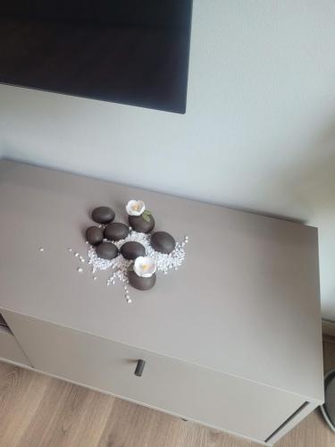 a table with some chocolates on top of it at Joohane Jejudo House in Jeju