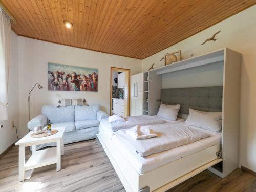 Ένα ή περισσότερα κρεβάτια σε δωμάτιο στο Ferienhof Augustenhöhe