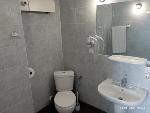 Ένα μπάνιο στο Apartamenty CENTRUM Konin