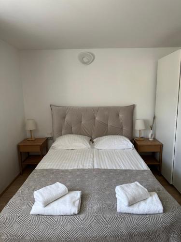 Giường trong phòng chung tại Nidos Palvė Ground Zero