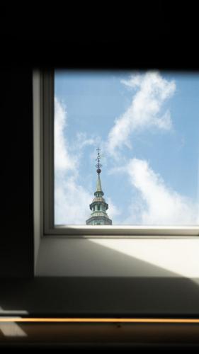 a view of a building through a window at Boutique Hotel Herman K in Copenhagen