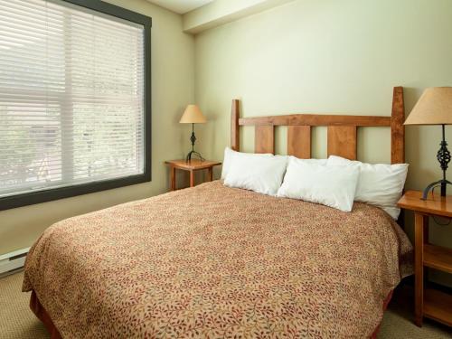 Gulta vai gultas numurā naktsmītnē Panorama Mountain Resort - Premium Condos and Townhomes