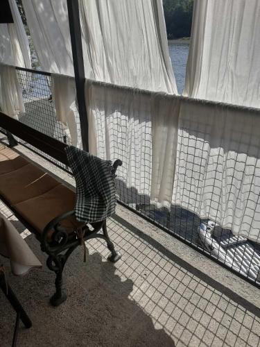 a window on a cruise ship looking out at the water at Vikendica Drinski mir in Loznica