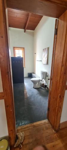 a bathroom with a toilet and a sink at Villa Villiers in Villiersdorp