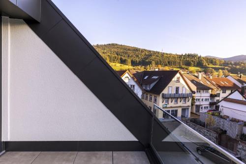 a view of a city from the balcony of a building at Apartments Bären in Elzach