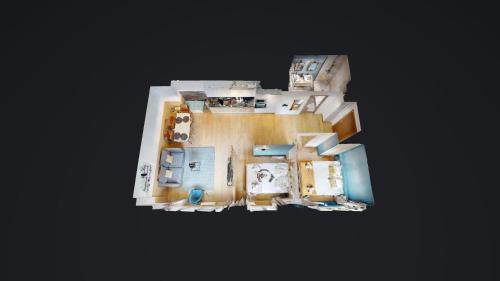 - une vue de tête sur une maison avec plan d'étage dans l'établissement Bluestay 85 - Superbe appartement à Paris, à Paris