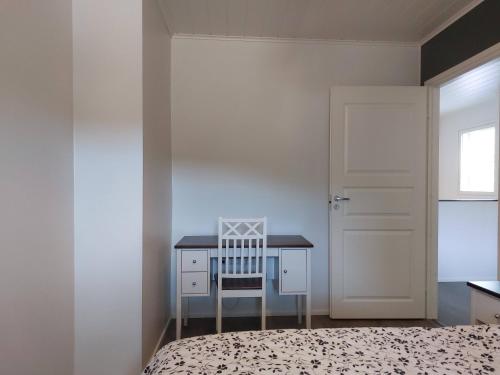 En eller flere senge i et værelse på Tupaskolo