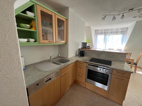 Küche/Küchenzeile in der Unterkunft Grüne Auszeit Apartments