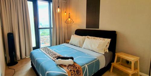 Postel nebo postele na pokoji v ubytování The ELEMENTS Condo, Jalan Ampang