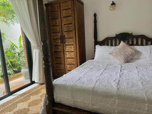 Postel nebo postele na pokoji v ubytování Villa Vikasa Colombo