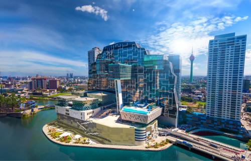 an aerial view of a city with tall buildings at Cinnamon Life at City of Dreams in Colombo