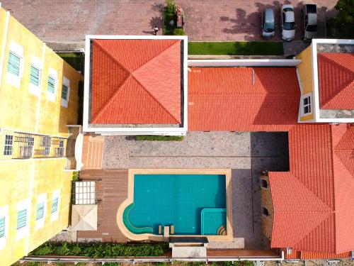 an overhead view of a building with a swimming pool at Grandsmile Wellness Resort in Pattaya