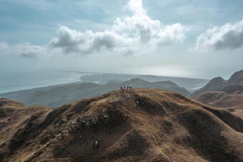 a group of people standing on top of a mountain at Panama Kite Center in Punta Chame