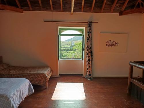 Postel nebo postele na pokoji v ubytování Vv Rural Finca Ecocielo