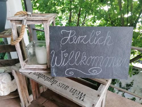 a sign that readsforthilliilliilliilliillilenessshe will always she at Ferienwohnung Seelenbaumler in Flonheim