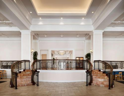 a staircase in a building with a lobby at Hyatt Regency Coconut Point Resort & Spa Near Naples in Bonita Springs