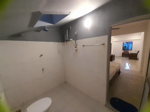 Koupelna v ubytování Sooriya villa
