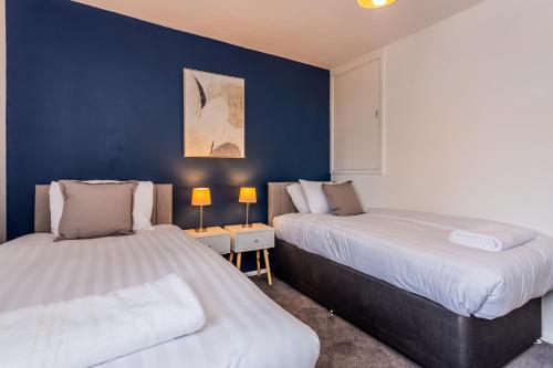 Giường trong phòng chung tại Bruce Place