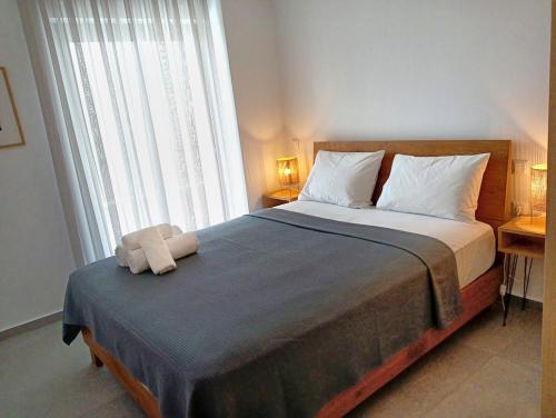 Cama o camas de una habitación en White luxury apartment